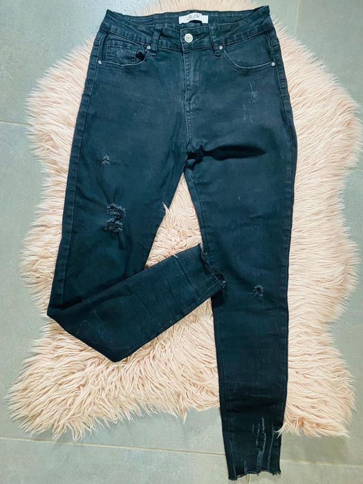 Modne spodnie/ jeansy z przetarciami See See, 38