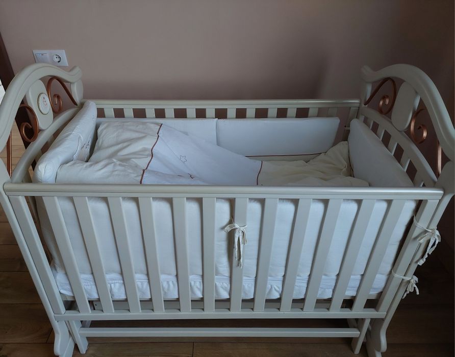 Дитяче ліжко-колиска