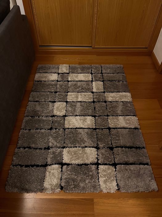 Carpetes em bom estado de conservação