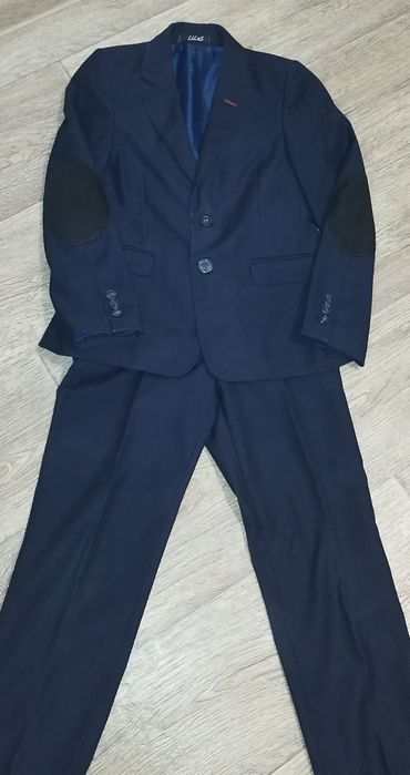 Шкільний костюм 128/134см