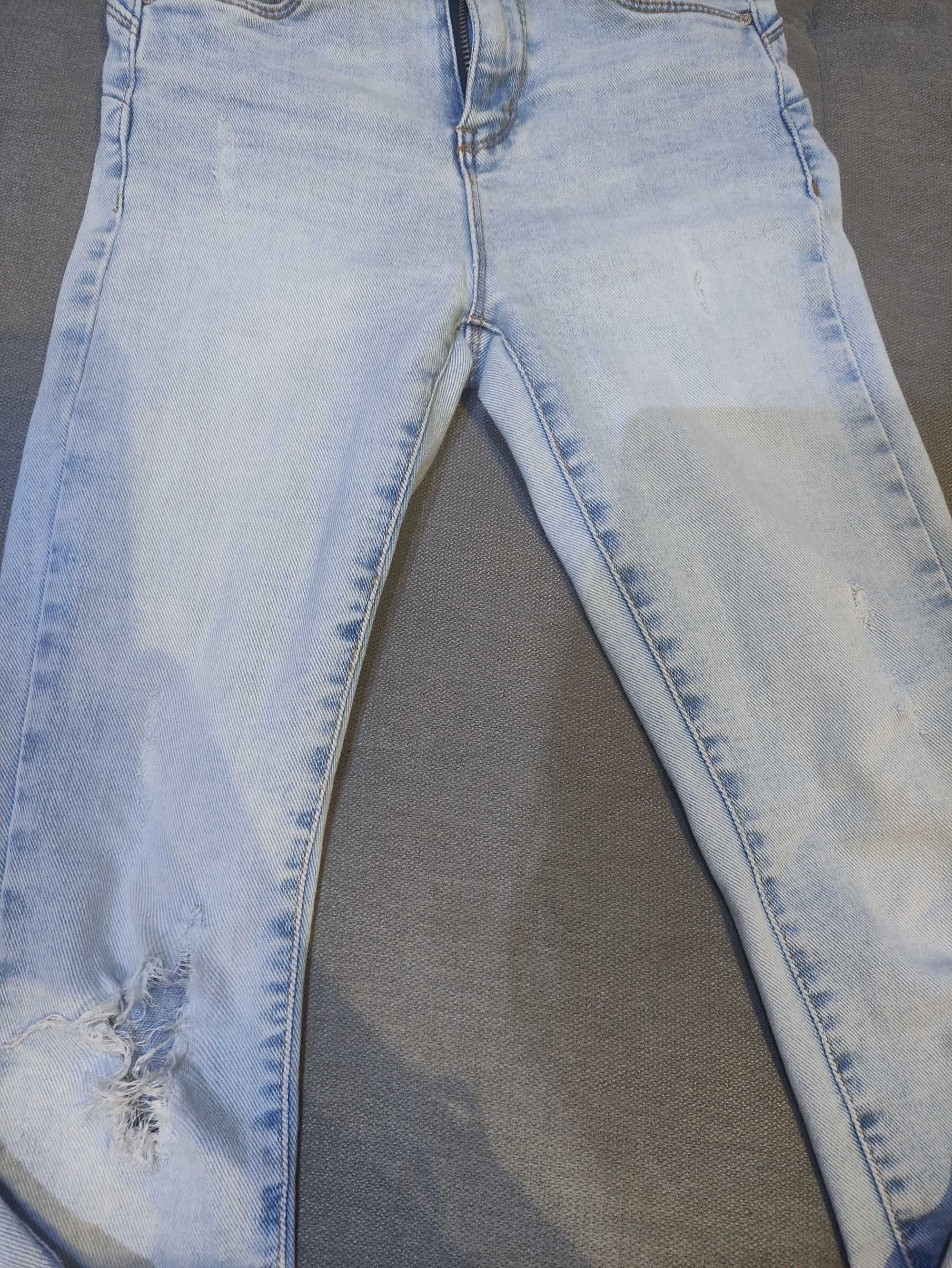 Spodnie jeansy dziury przetarcia jasne goodies XS dopasowane