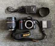 Nikon D3000 з обʼєктивом Tamron AF 18-200mm f/3,5-6,3 Di II + сумка