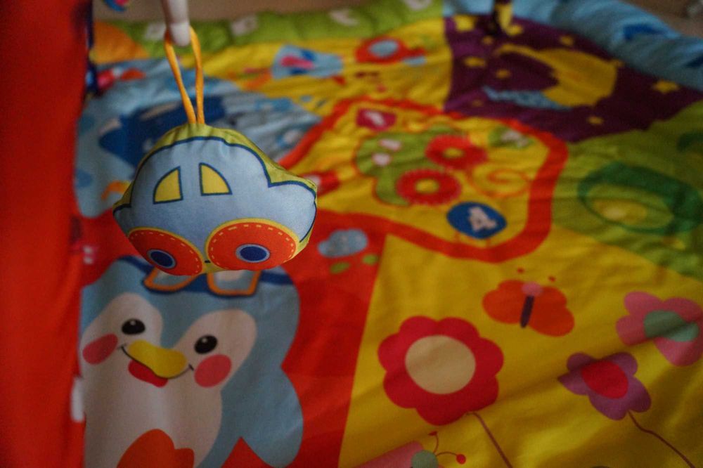 Manta de atividades para bebé.