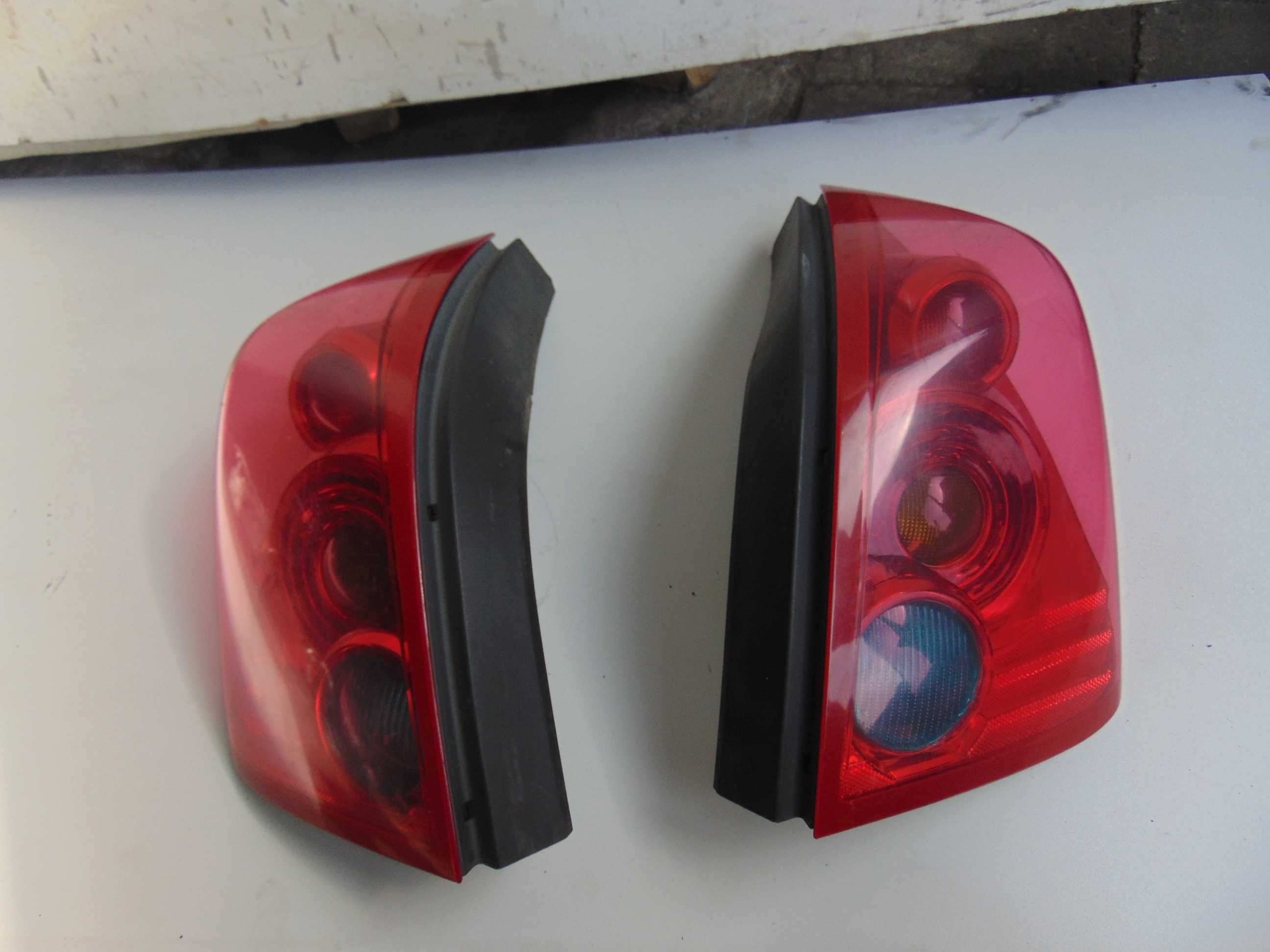 Lampa tył tylna lewa prawa Nissan Primera P12 HB