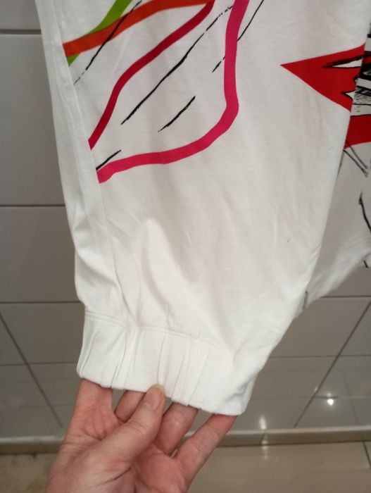 Śliczna biała bluzka, dzianina, aplikacja latawce. Solar