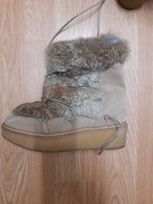 Botas de neve em pele  - em estado novo