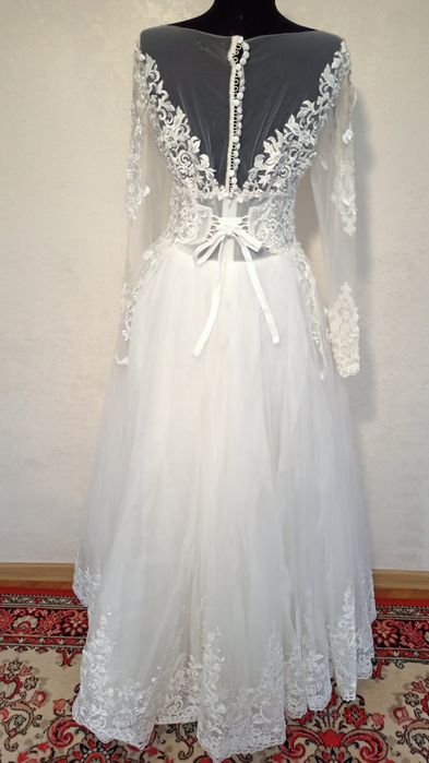 Нові 50 розміру весільні сукні