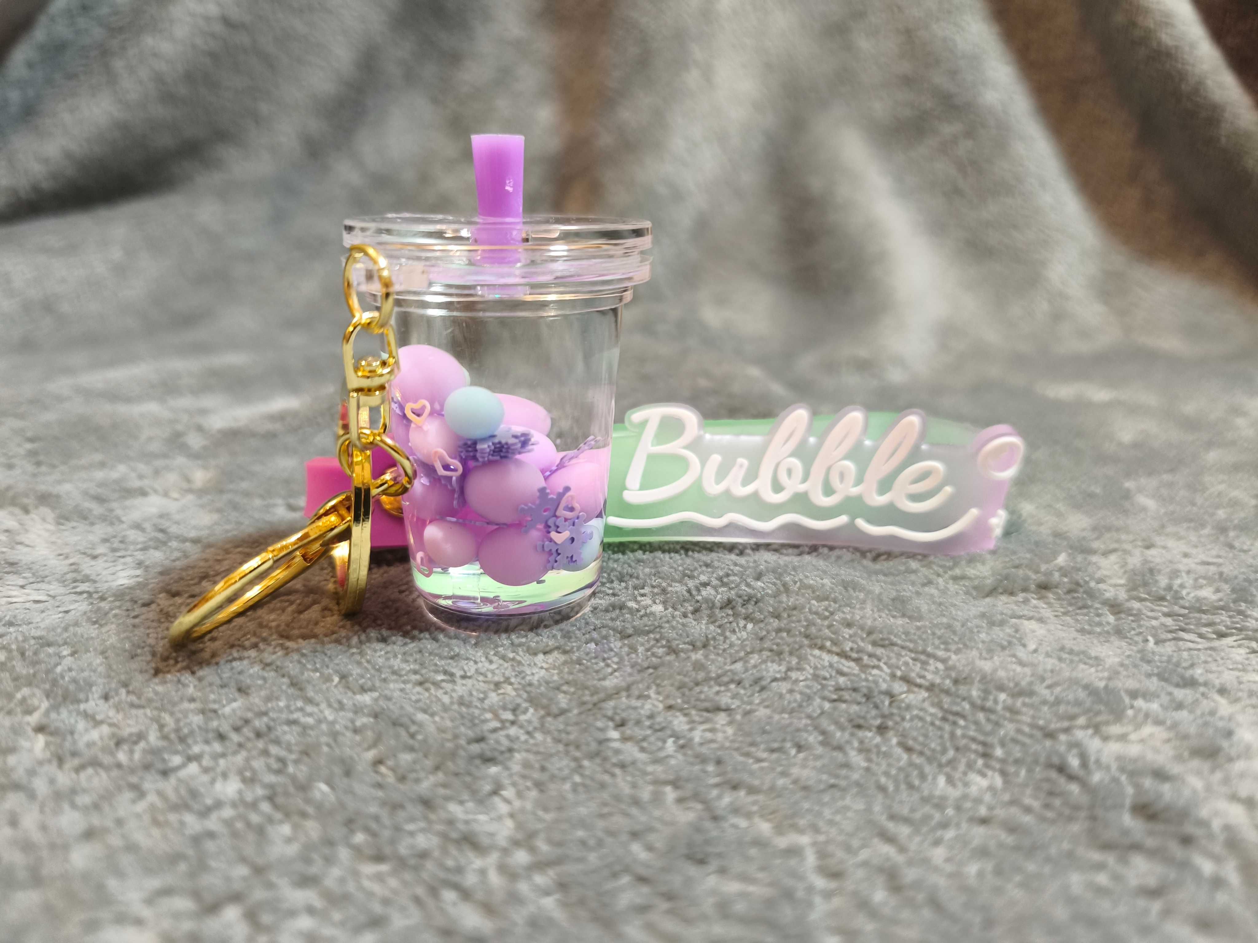 Duży fioletowy breloczek gadżet zabawka shake Bubble nowy