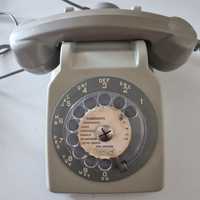Telefone  antigo com orelha extra