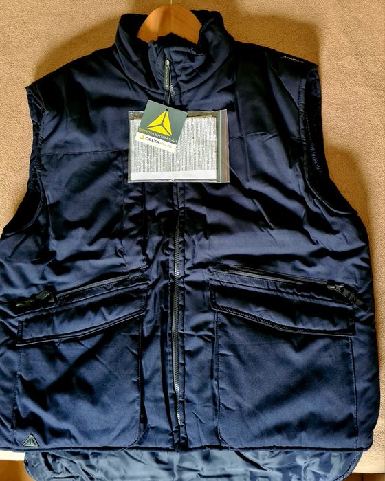 Colete  novo multifuncional multibolsos
Novo a estrear xxl n 52-56
De