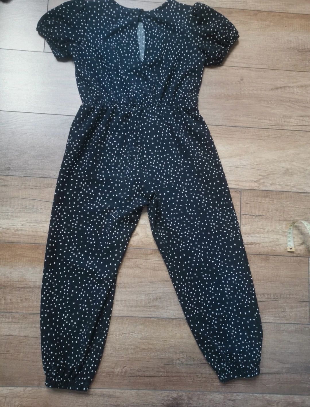 Kombinezon Primark 122 czarny w kropki