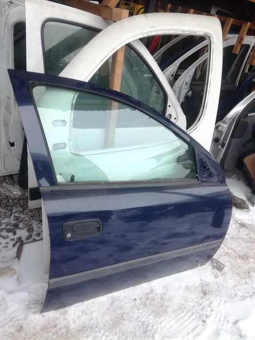 Двері передні+задні  Opel Astra G