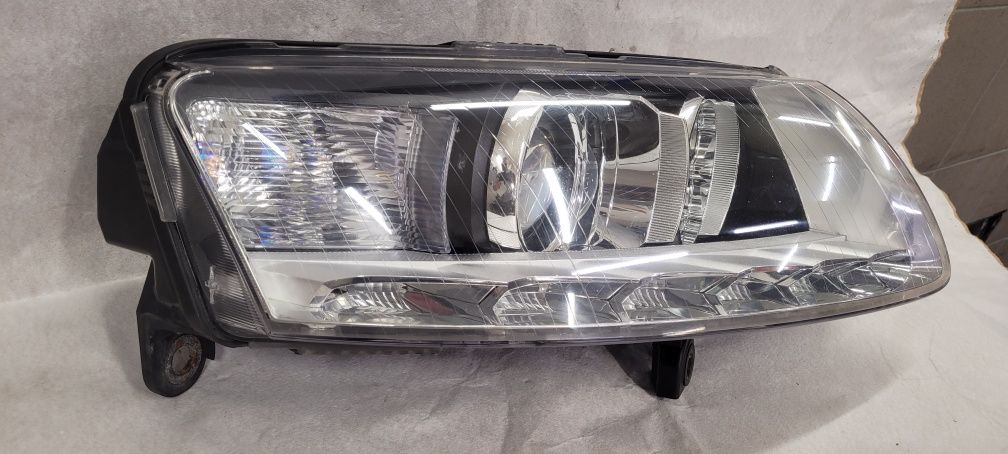 Audi A6 C6 lift 4F0 lampa prawa przednia xenon nieskrętny