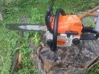 Pilarka Spalinowa Stihl MS 180. Prowadnica zakręcana na 2 śruby