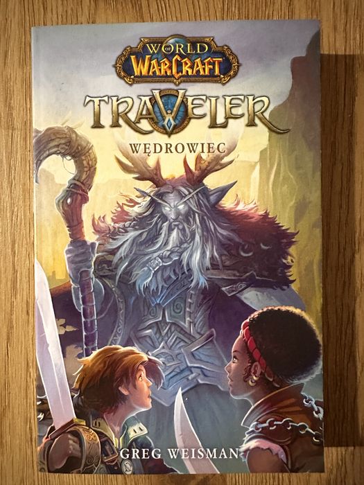 Ksiazka „Warcraft” i „Nie odpuszczaj”