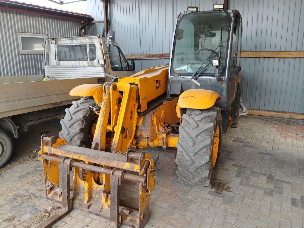 Koparko ładowarka jcb 4cx 530 70 manitou ulm 412 teleskop zamina rozli