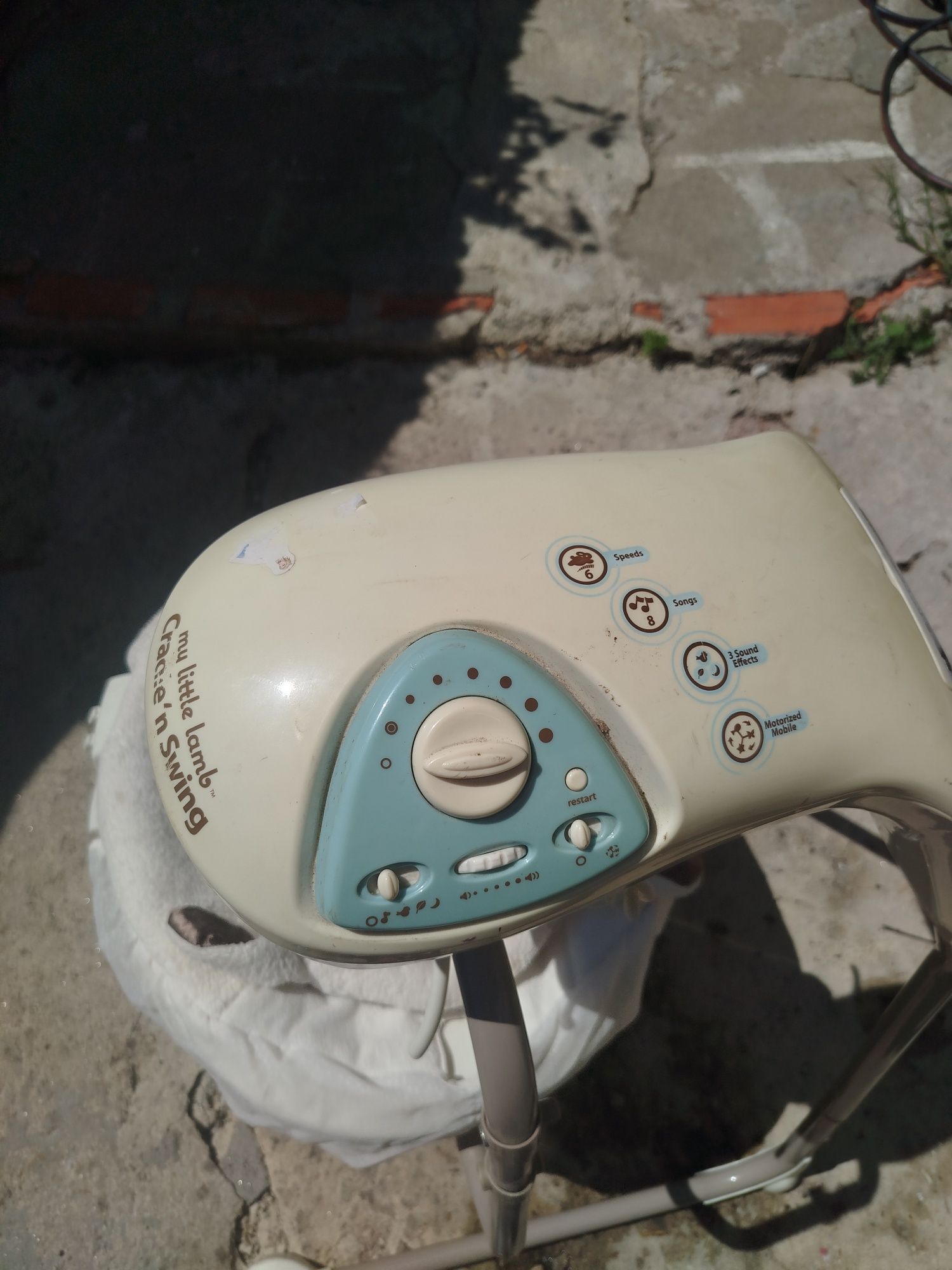 Cadeira de balanço, marsupio e saco de dormir para bebê