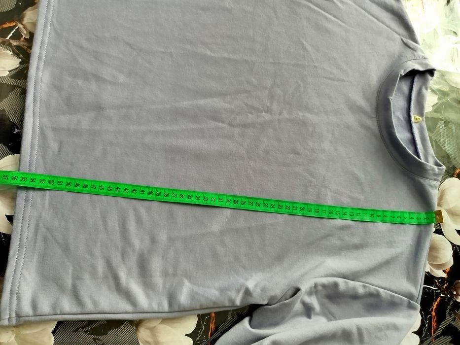 Костюм бузкового кольору