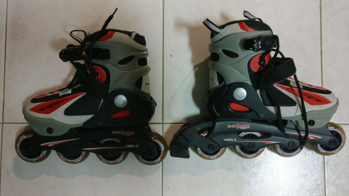 Patins em linha tam. regulável 34 a 36, c/ proteções e saco transporte