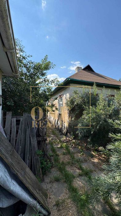 Будинок з зем. ділянкою 13.38 соток в центрі села Велика Олександрівка