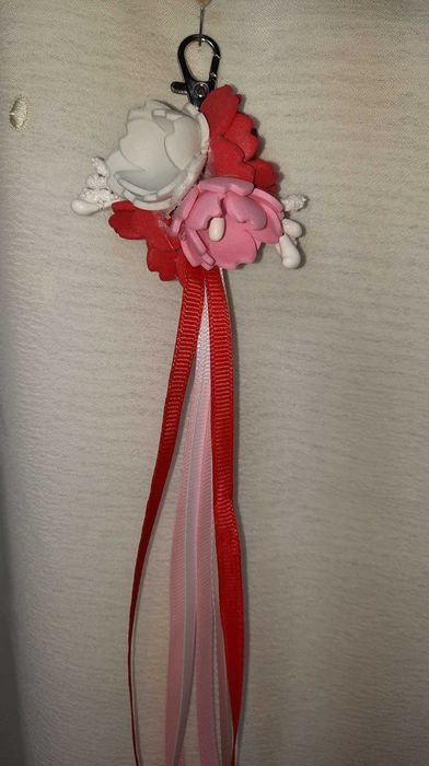 porta chaves ou um acessório para mala um presente lembrança