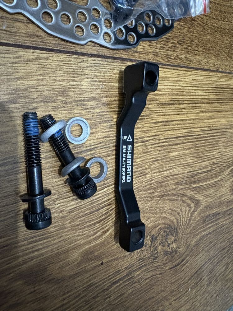 Tarcza hamulcowa SHIMANO DEORE SM-RT56 180mm 6 śr + adapter