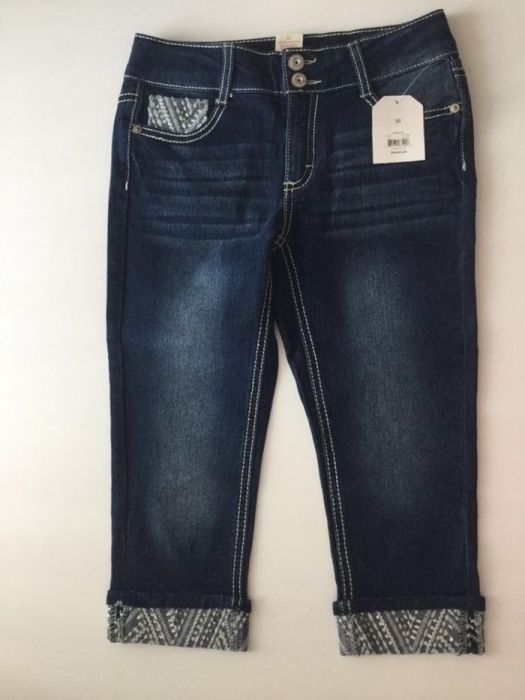 Nowe spodnie dżinsowe jeansy r. 134-140