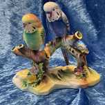 Aves casal em tronco base porcelana pintura manual 15 cm