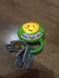 Продам детские игрушки (игрушка на коляску,юла, мягкие игрушки)