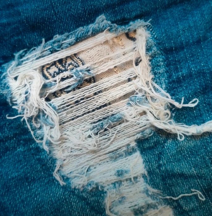 Spodnie z dziurami r 27