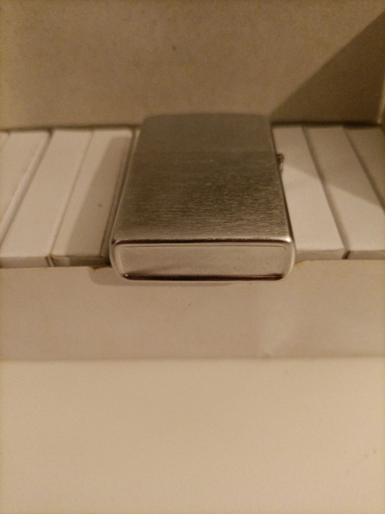 Isqueiro tipo zippo