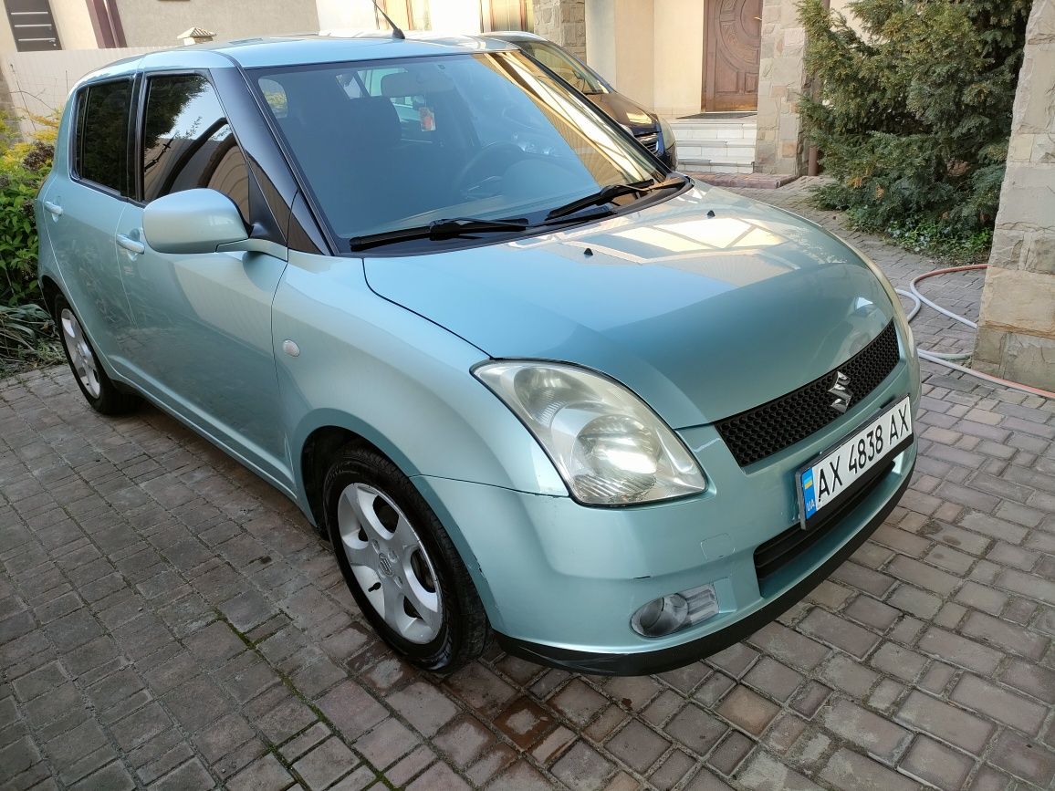 Suzuki Swift 2007,  1,3, robot