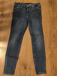 Damski jeansy ciemnoniebieske