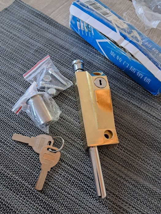 Trava de Porta Dourado com chaves - Amazon