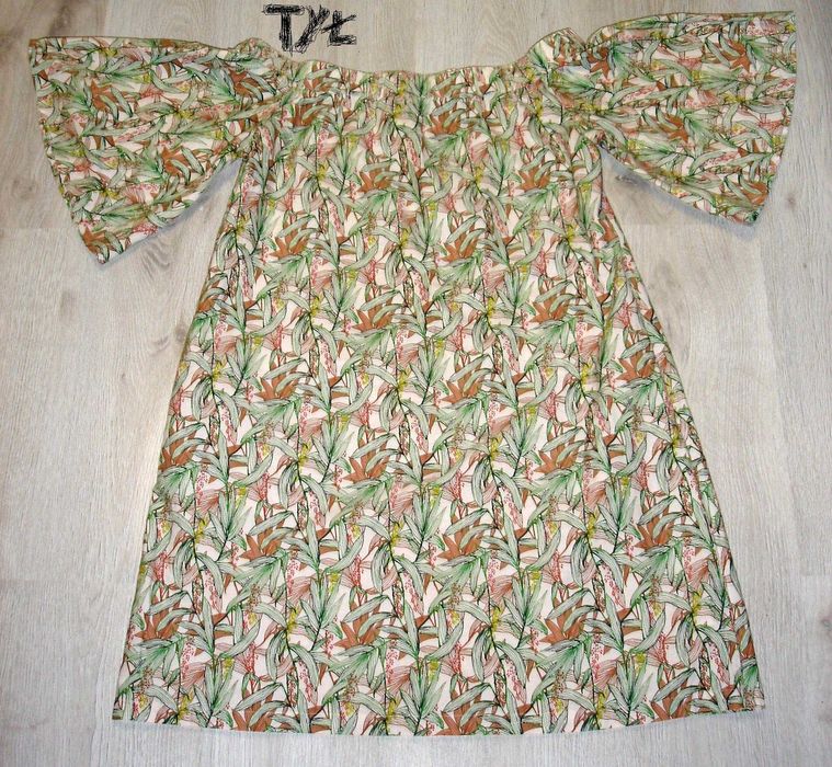 Letnia,bawełniana luźna sukienka H&M rozmiar34, wzór liście.