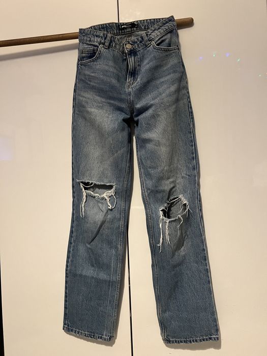 Spodnie jeansowe z dziurami