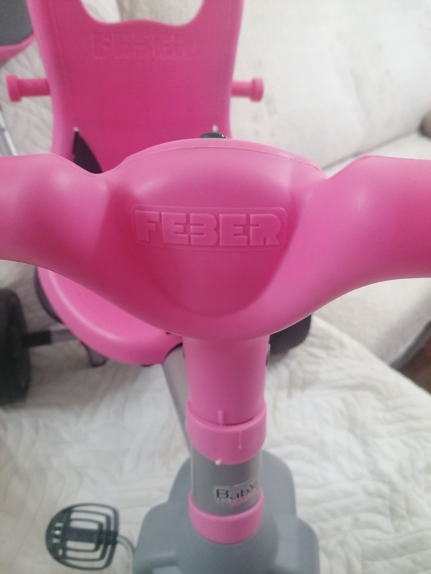 Triciclo rosa com sons