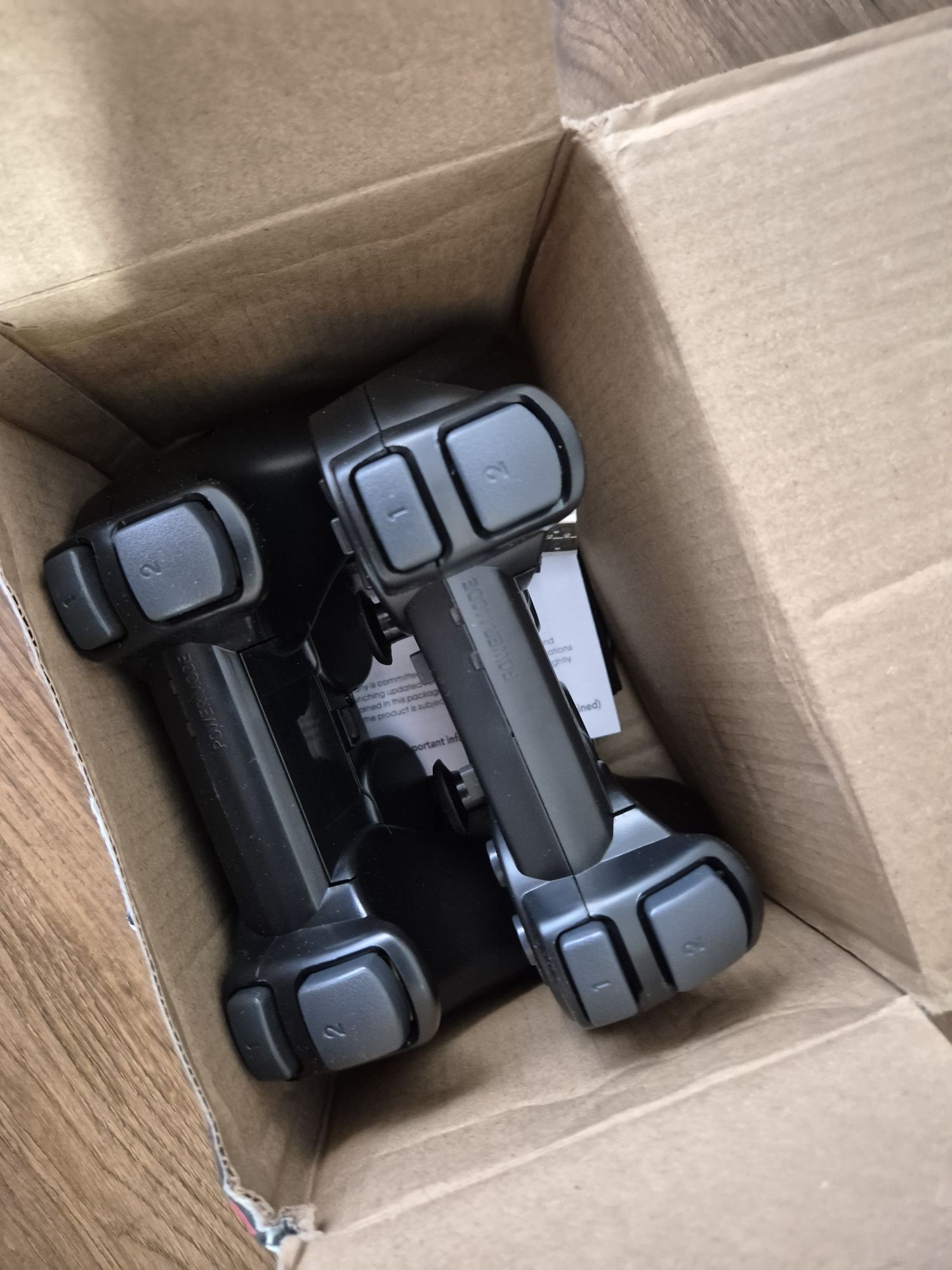 Console de video game portátil em formato de "stick"