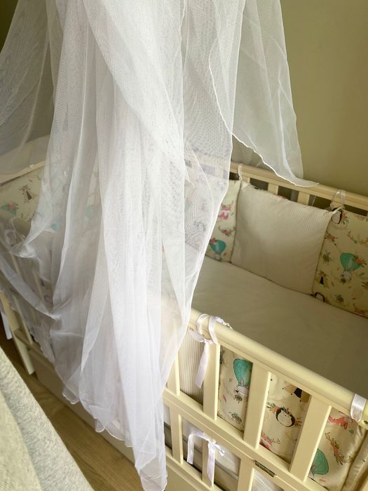 Дитяче ліжечко-манеж