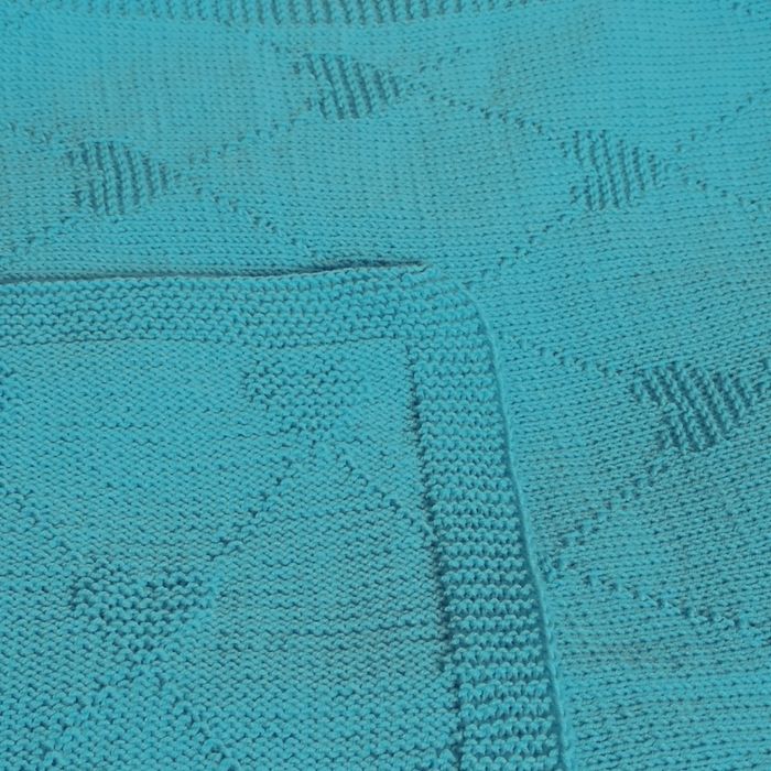 Ręcznie robiony kocyk dla niemowlaka z wełny merino