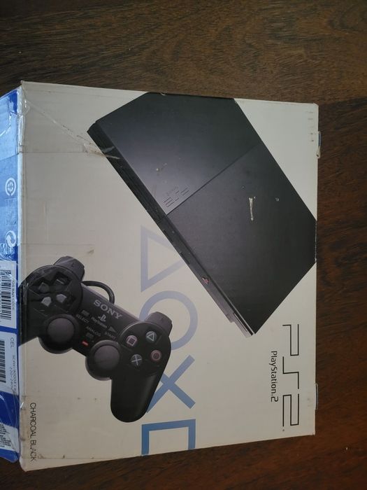 PlayStation 2 em excelente estado + 2 comandos + cartão de memória
