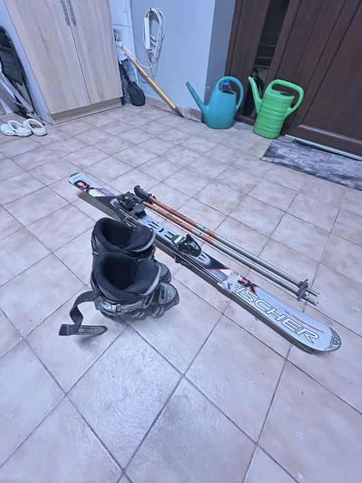 Sprzedam Narty Fisher z kijkami i butami