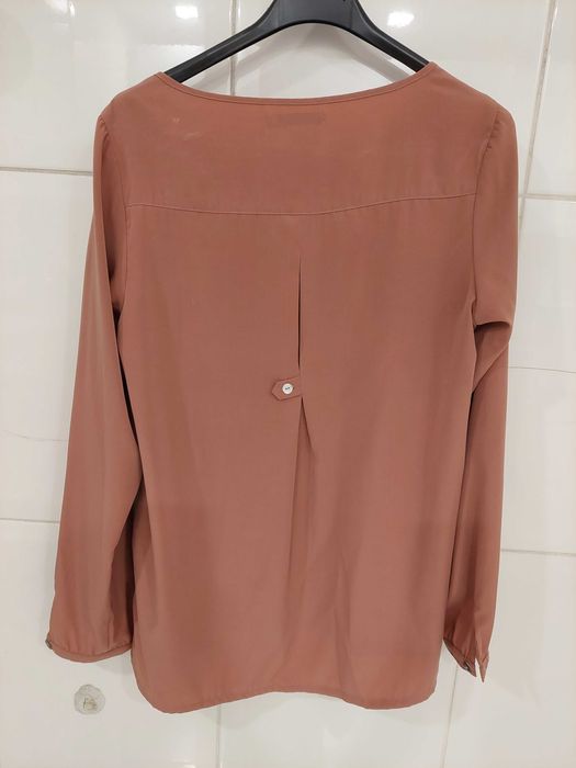 Tunica em tecido fluido