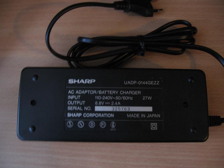 Зарядное устройство для видео камеры Sharp 6,8V 2,4A