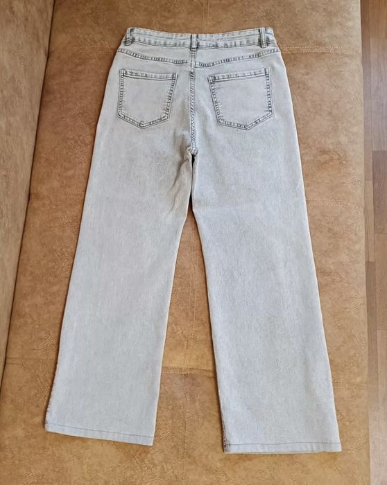 Джинси з ефектом варки,легкий клеш,розмір 31-32