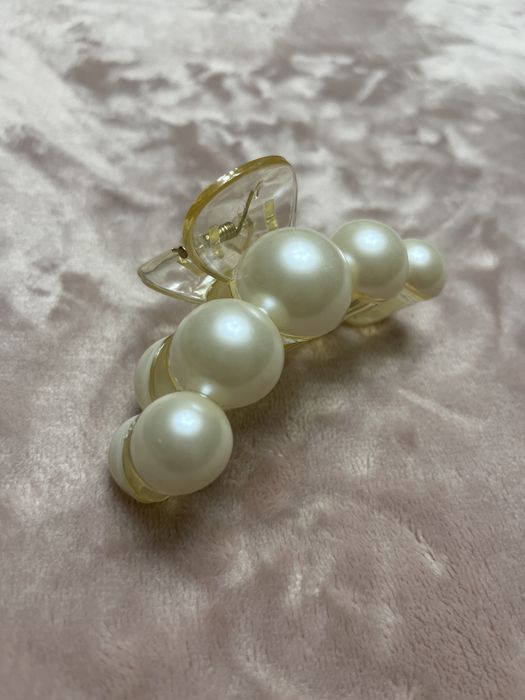 Mola cabelo com pérolas