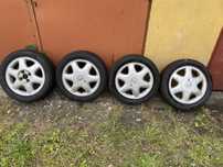używane felgi aluminiowe  5½J x 15; 4x100 z oponami;  opel
