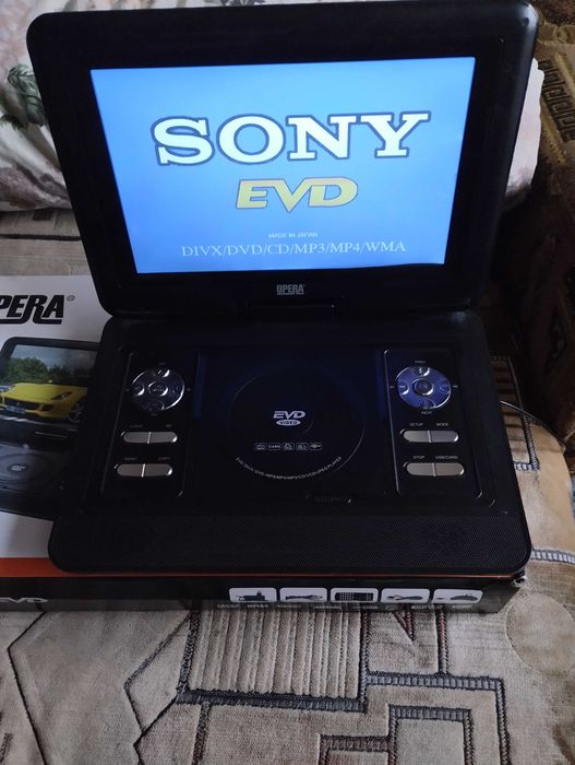 Продам  портативный ДВД