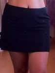 Mini saia em preto de griffe