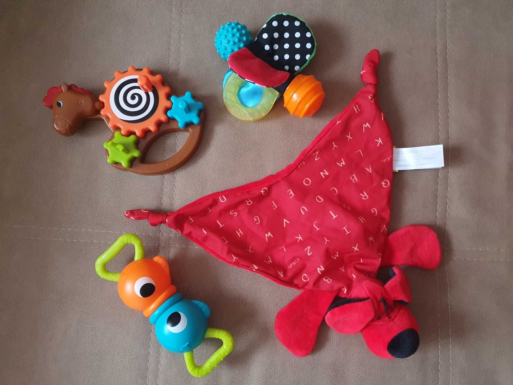 Іграшки прорізувачі, бряскальця, крутилки для дитини K`s Kids від 0М